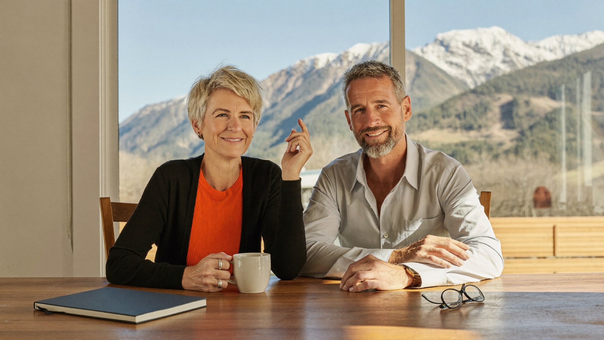 A couple in their sixties at their kitchen table